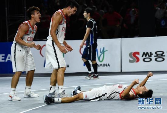 资料图:在第18届亚运会男子三人篮球决赛中,中国队以19比18战胜韩国队,获得冠军。 图片来源:新华网 记者李响摄 资料图:在第18届亚运会男子三人篮球决赛中,中国队以19比18战胜韩国队,获得冠军。 图片来源:新华网 记者李响摄