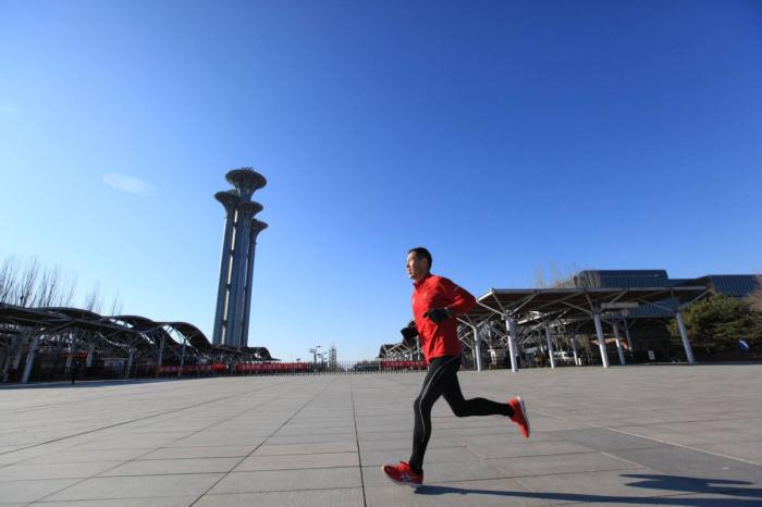 李华仲在跑步中。受访者供图。 李华仲在跑步中。受访者供图。