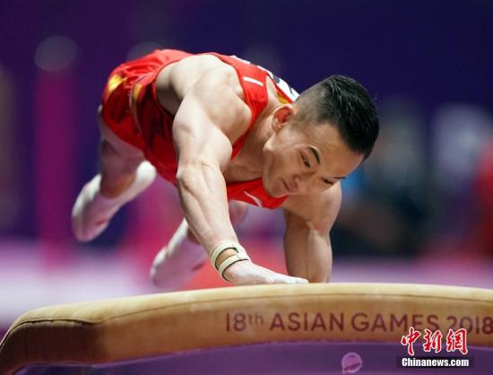 资料图:肖若腾在跳马比赛中。中新社记者 侯宇 摄 资料图:肖若腾在跳马比赛中。/p中新社记者 侯宇 摄