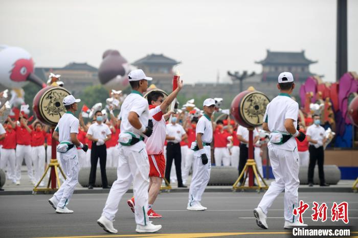 十四运会和残特奥会火炬传递16日在西安“开跑”。 十四运会西安市执委会 摄 十四运会和残特奥会火炬传递16日在西安“开跑”。 十四运会西安市执委会 摄